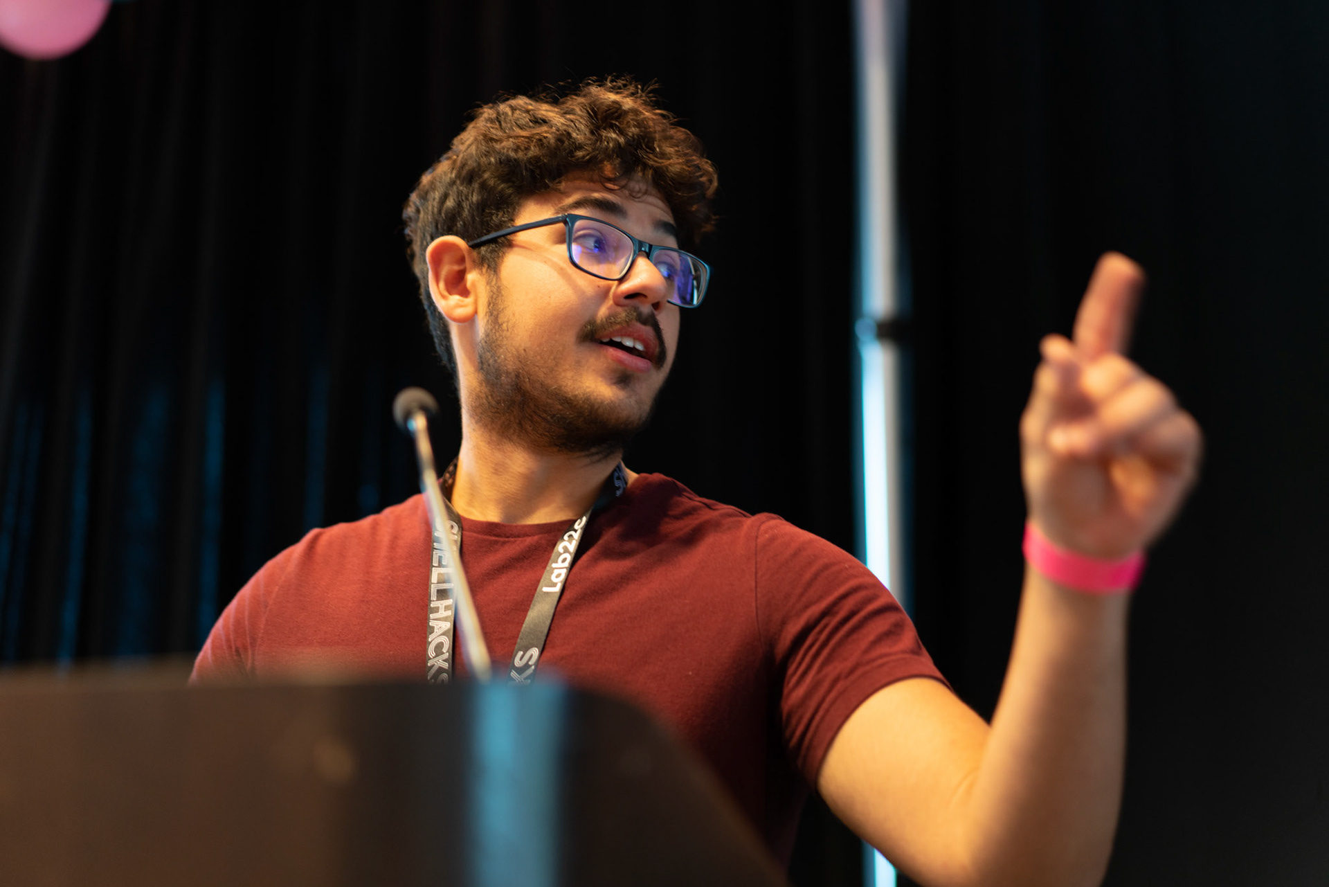 Edward Franco speaking at a podium